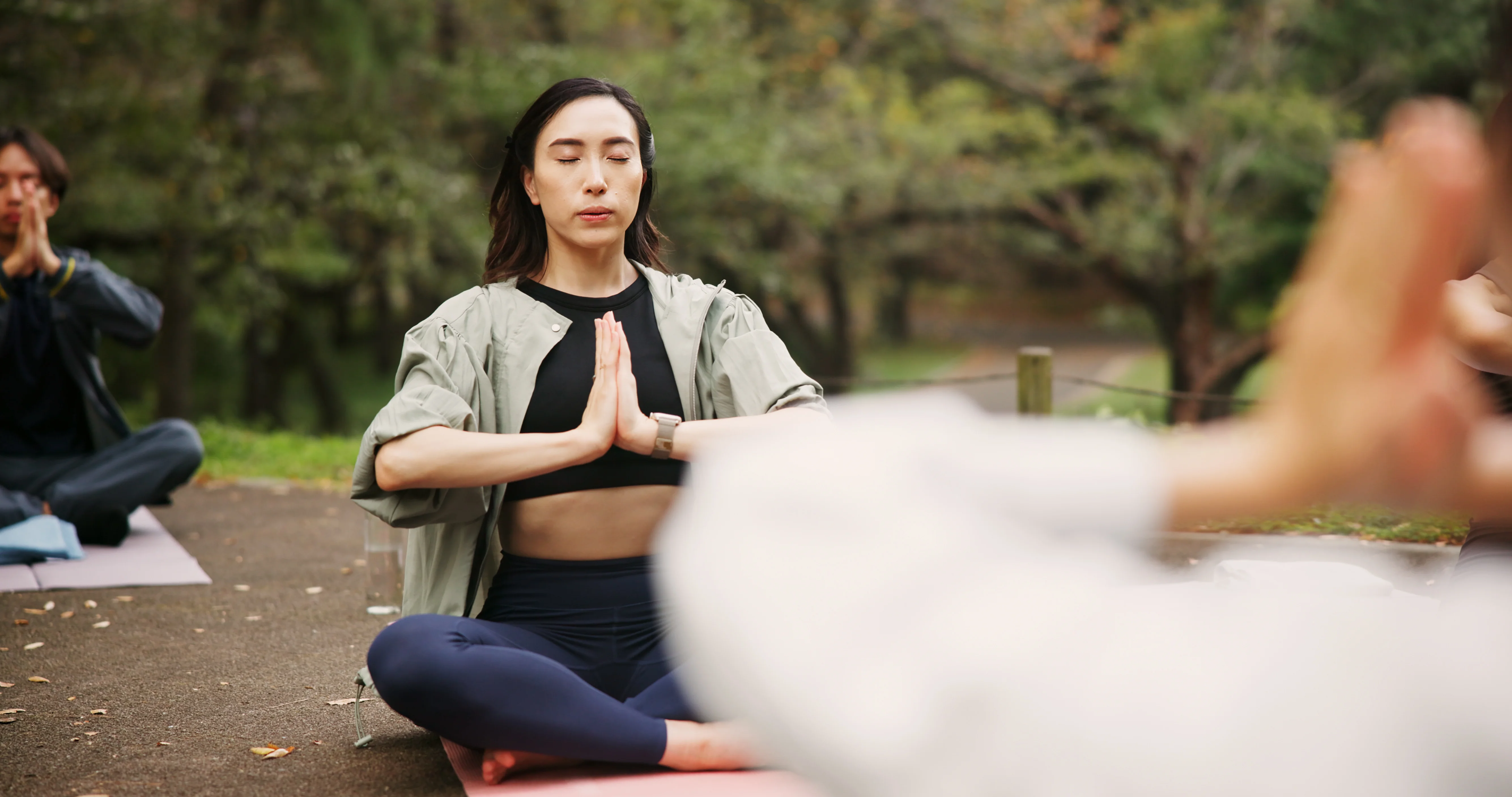 A woman sitting in meditation